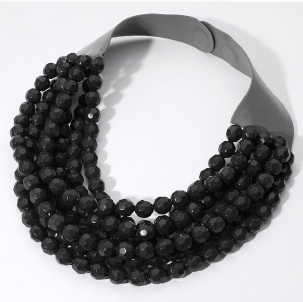 This Necklace is Not Black Is Dark Grey.